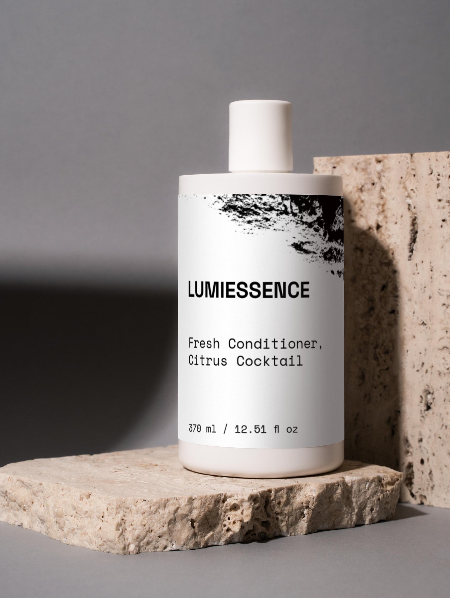 Woman with smooth, shiny hair after using Citrus Cocktail conditioner.