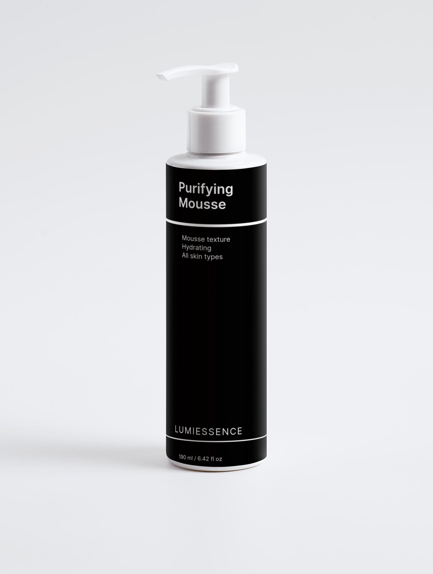 Purifying mousse bottle with sleek, modern packaging.